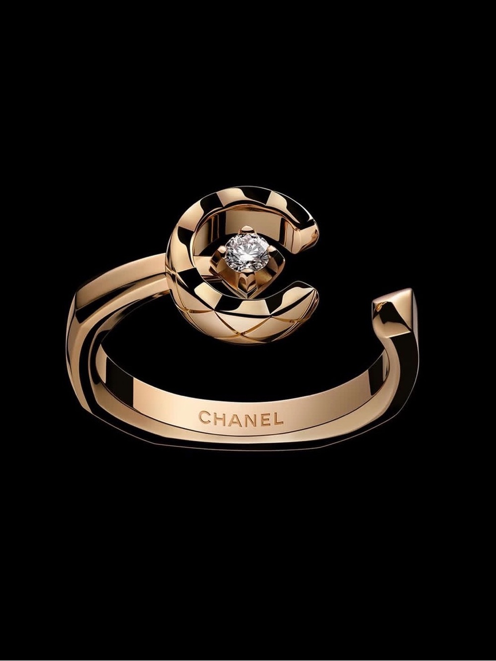 Chanel coco ring.